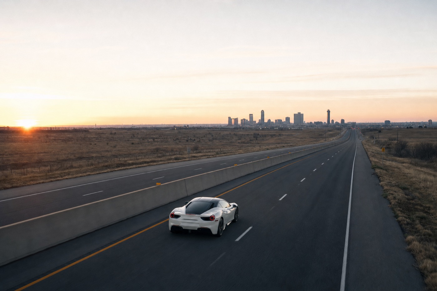 Houston and Dallas exotic car rental corridor: a white Ferrari on an empty Texas interstate heading toward a distant skyline